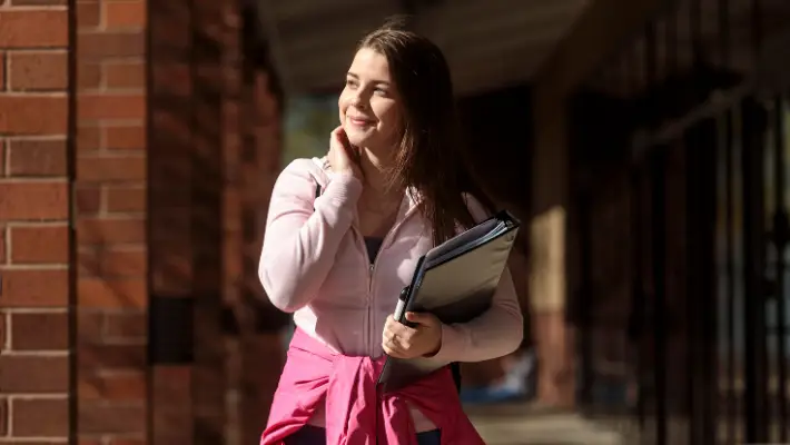 Young college-bound student contemplates taking a gap year. 