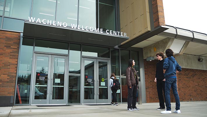 Students gather in front of the Welcome Center