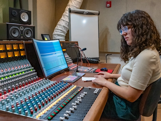 Student working lab soundboard