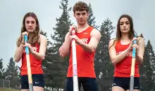 Athletic students holding polearms