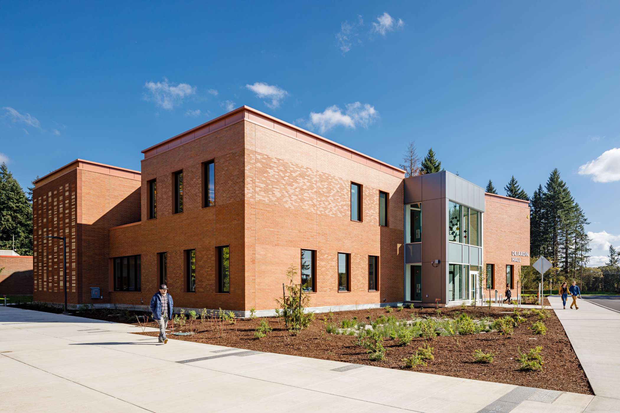 The exterior of DeJardin Hall on a sunny day The exterior of DeJardin Hall on a sunny day
