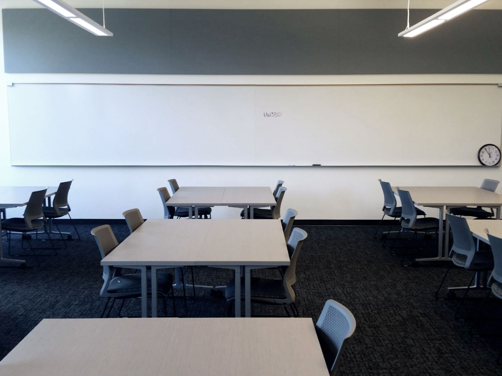 Chairs, tables and whiteboard in Harmony Campus classroom Chairs, tables and whiteboard in Harmony Campus classroom