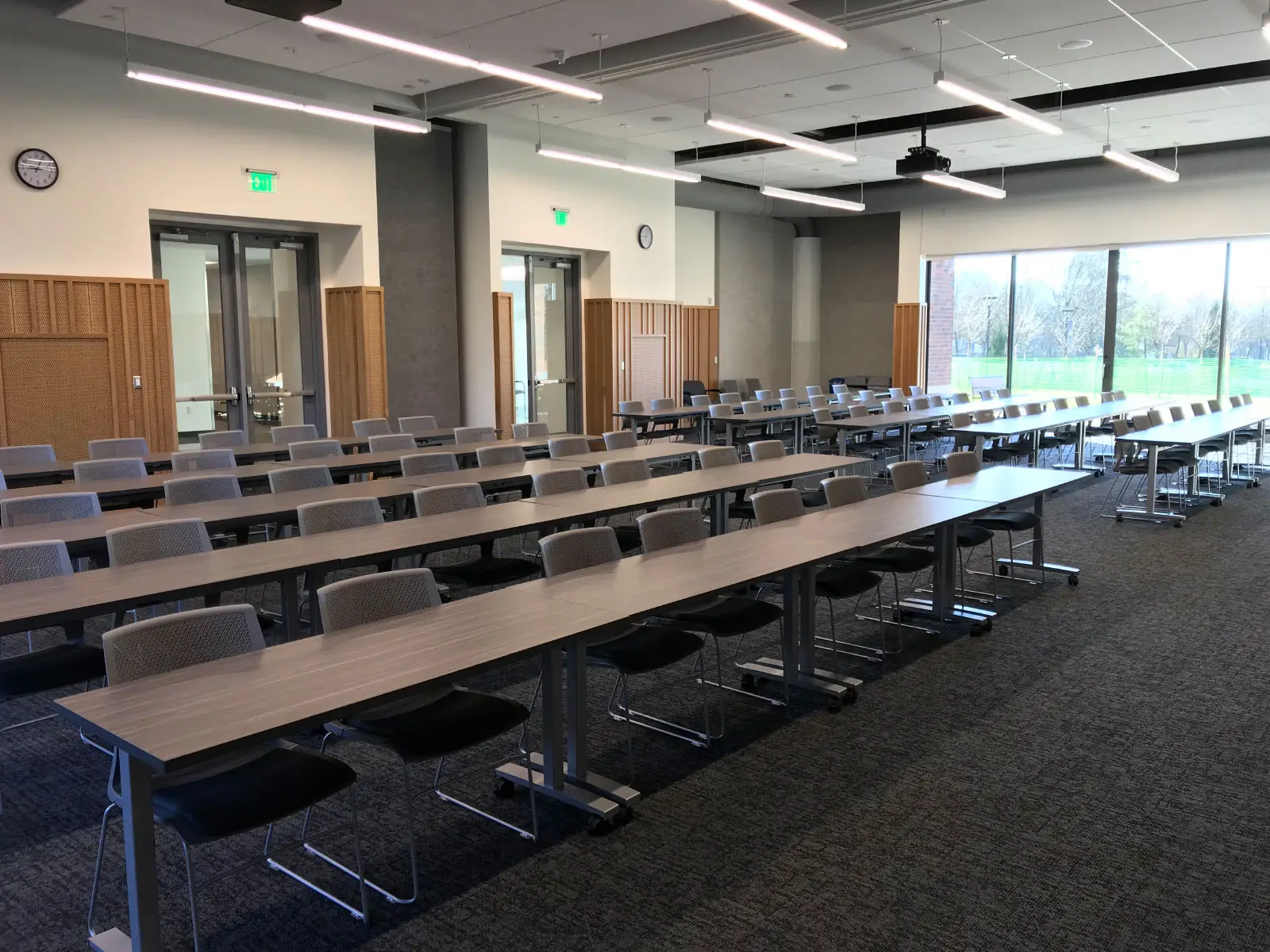 Rows of chairs and tables in Harmony Campus community room Rows of chairs and tables in Harmony Campus community room