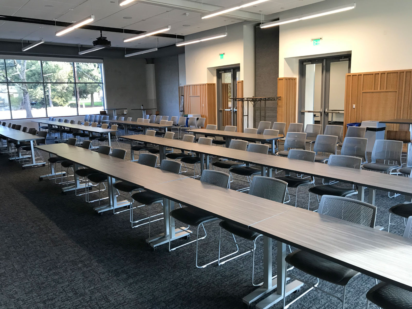Rows of chairs and tables in a Harmony campus community room Rows of chairs and tables in a Harmony campus community room