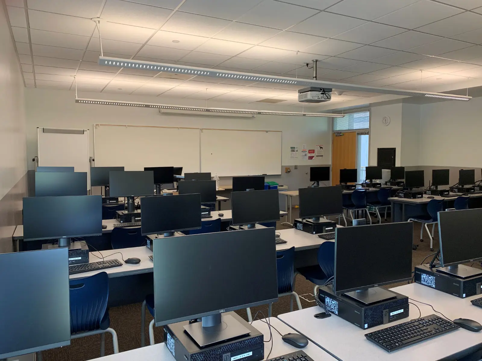 Angled close-up of rows of computers on desks in Wilsonville's Computer Lab W211 Angled close-up of rows of computers on desks in Wilsonville's Computer Lab W211