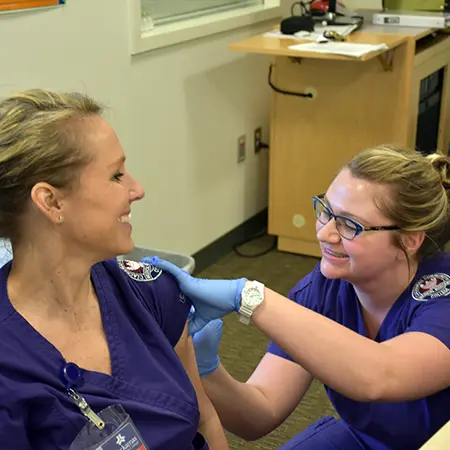 CCC students practice drawing blood