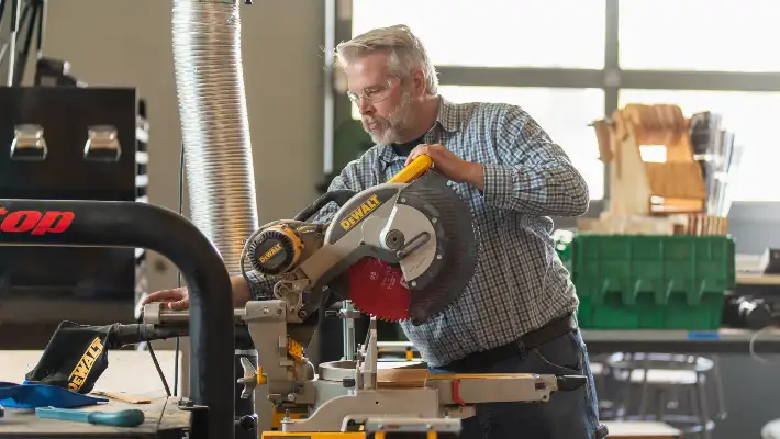 Person using power saw in Makerspace