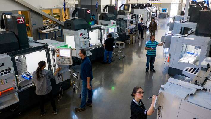 CTE students demonstrating machinery at the CTE showcase